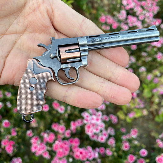 Discover the Charm of the Old West with the "World-Famous Tiny Gun Bison Revolver Metal Replica"